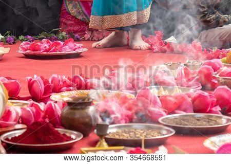 Wedding Ceremony, Traditional Indian Hindu Marriage Ritual With Red Flowers And Attributes