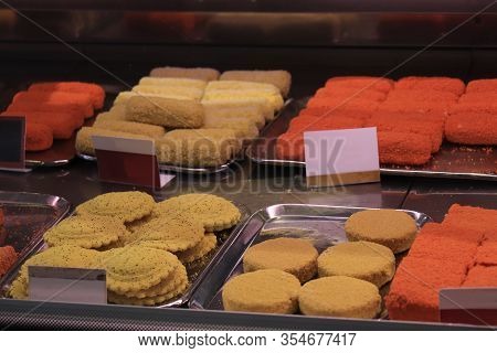 Various Sorts Of Raw Snacks On Display In A Fast Food Restaurant