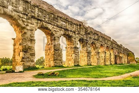 Ruins Of The Iconic Parco Degli Acquedotti, Rome, Italy. The Public Park Is Named After The 7 Ancien