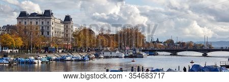 Zuerich, Switzerland - November 9, 2019. Panoramic View Of The Limmat Embankment On A Cloudy Autumn 
