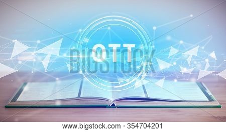 Open book with OTT abbreviation, modern technology concept