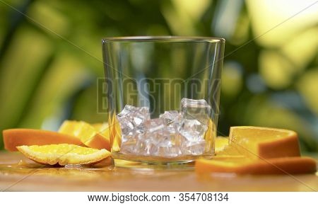 Sliced Orange And Glass With Ice
