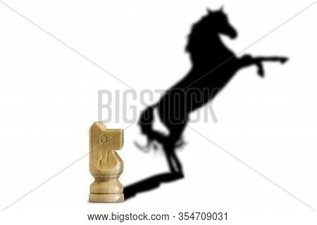 White Knight With An Art Shadow Isolated On White Background. Represents Conceptions Of Advancement,
