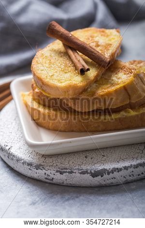 Traditional Homemade Spanish Torrijas On Wooden Background. Easter Dessert. Spanish Torrijas