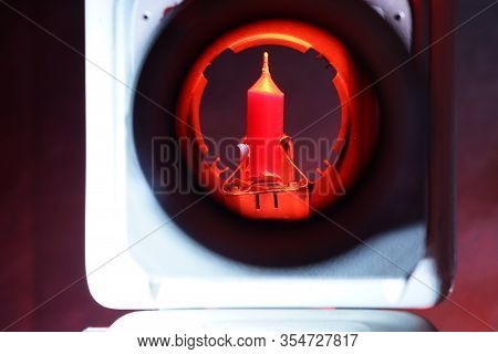 Old Slide Projector With Slide Frame Photographed In The Studio With Flash Light