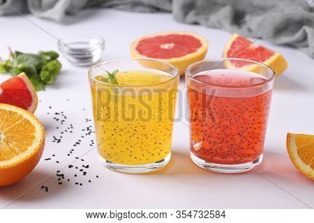 Trendy Tropical Orange And Grapefruit Juice With Basil Seeds Or Falooda Seeds Or Tukmaria In Glass O