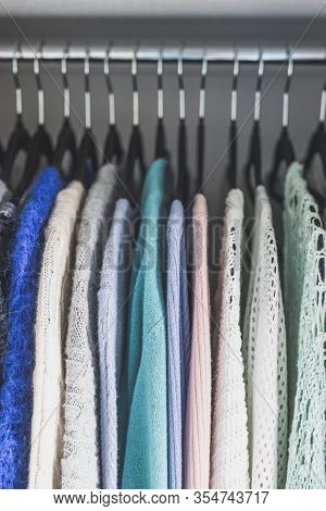 Organizing And Tidying Up Conceptual Still-life, Wardrobe With Tidy Selection Of Different Knits Lin