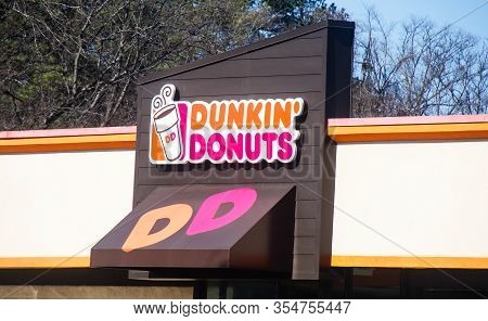 Dunwoody, Georgia- January 5, 2012: Dunkin Donuts Is An American Multinational Coffeehouse And Donut