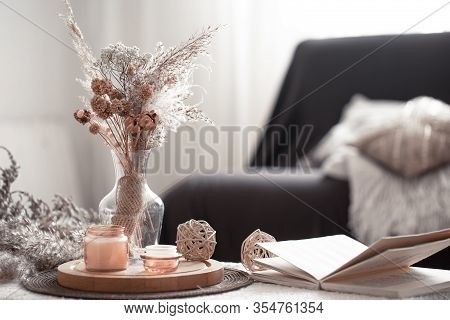 Home Cozy Still Life With A Black Sofa And Decor In The Living Room.