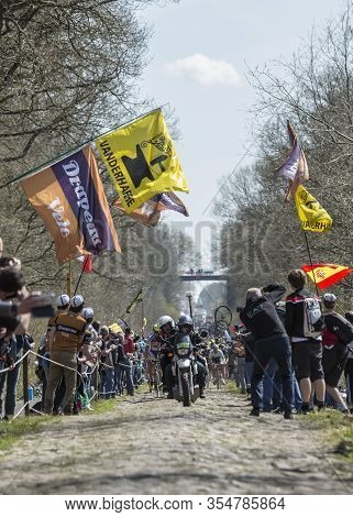 Wallers,france - April 12,2015: The Peloton Approaching Through A Crowd Of Excited Spectators On A C