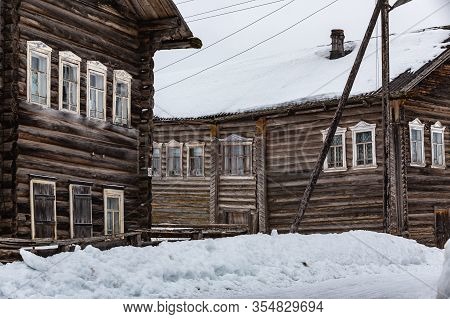Russian Ancient Two-storied Wooden Houses In Kizhma Village. Arkhangelsk Region, Russia