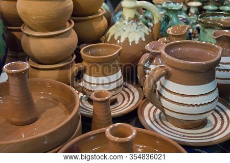 Pottery Jugs At The Fair. Handicrafts Of Folk Potters.