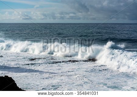 Dangerious Ocean Stormy Waves Hits Black Lava Rocks By Faro De Las Hoyas, La Palma Island, Canary, S
