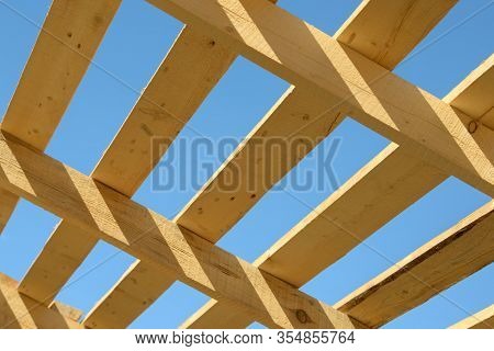 Wood Board Assembled On Construction Site. New Frame Structure Of Building. Scaffolding Framework Ma