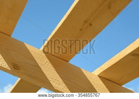 Wood Board Assembled On Construction Site. New Frame Structure Of Building. Scaffolding Framework Ma