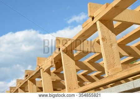 Wood Board Assembled On Construction Site. New Frame Structure Of Building. Scaffolding Framework Ma