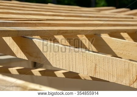 Wood Board Assembled On Construction Site. New Frame Structure Of Building. Scaffolding Framework Ma