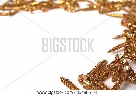 Gold Torx Screw Isolated On White. Yellow Zinc Chipboard Screw Torx, , Full Thread Close Up