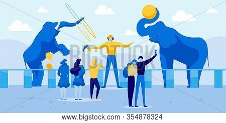 Animal Trainer With Cute Elephants Show Tricks For Kids And Adults. Couple In Love Taking Selfie On 