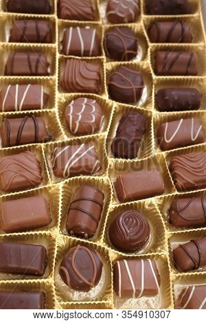 Chocolate Candy Set Close-up.assorted Chocolate Sweets.chocolate Candies Set In An Open Box. Top Vie