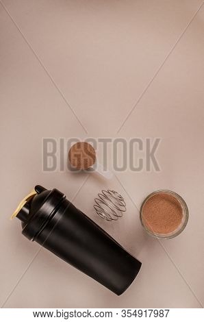 Whey Protein Powder In Scoop And Plastic Shaker On Neutral Beige Background. Vanilla And Chocolade F