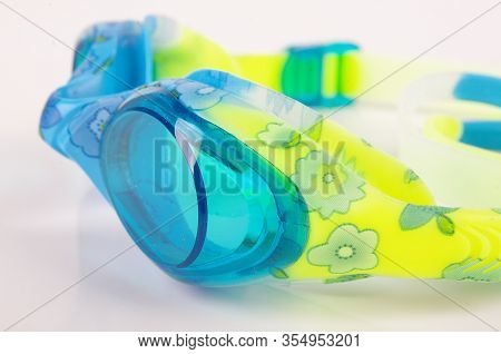 Swimming Goggles Isolated On The Bright Background