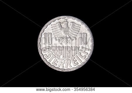 L.50 italian coin isolated on the dark background
