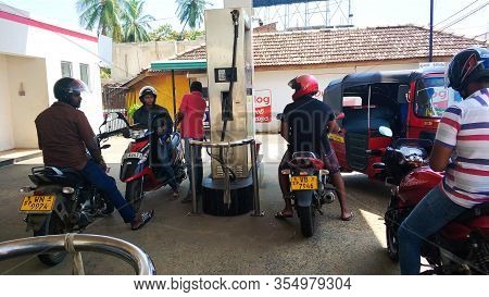 Scooters Are Refueled At A Gas Station In Sri Lanka. Colombo / Sri Lanka - 02.08.2018