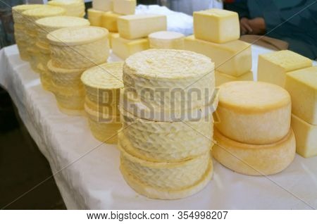 Stacks Of Peruvian Fresh Cheese For Sale In San Pedro Market In Cuzco, Peru, South America