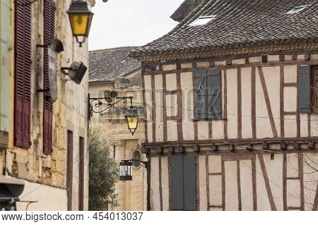 Facade Of Half Timbered Houses, Medieval Buildings, In A Typical French Medieval Village And City, B