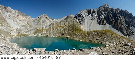 Beautiful Small Lake In The Mountains Above Ubaye Valley In French Alps - Lac Bleu