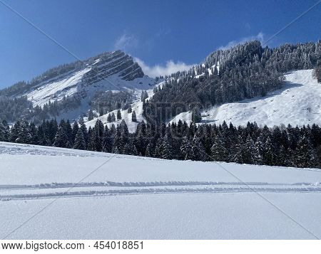 Fairytale Alpine Winter Atmosphere And Snow-capped Alpine Peaks Stockberg (1781 M) And Chli Stockber