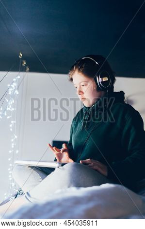 Secondary School Age Teenager Girl Is Home Schooling Using Laptop And Smartphone, Online Education, 