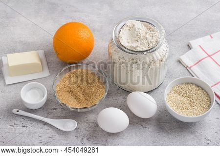 Ingredients For Baking Orange Sesame Cookies (koulourakya Or Other): Flour, Brown Sugar, Orange, Ses