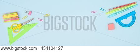 School Stationery On Blue Background, Banner Size, Flat Lay With Space For Text. Back To School