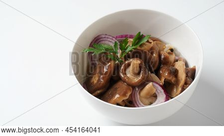 Salted Mushrooms, Lactarius Resimus, Autumn Harvest. Homemade Pickled Mushrooms, Marinated Red Onion