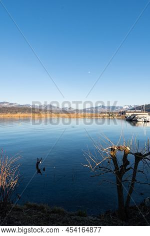 Wangen-lachen, Switzerland, February 13, 2022 View Over The Lake Of Zurich To The Small Airfield On 