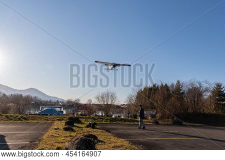 Wangen-lachen, Switzerland, February 13, 2022 Cessna F152 Airplane Is Approaching To A Small Aerodro