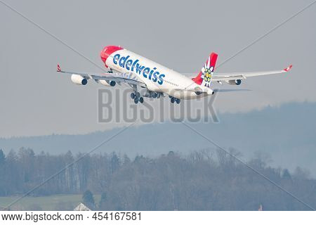 Zurich, Switzerland, March 2, 2022 Edelweiss Air Airbus A340-313 Aircraft Is Departing From Runway 2