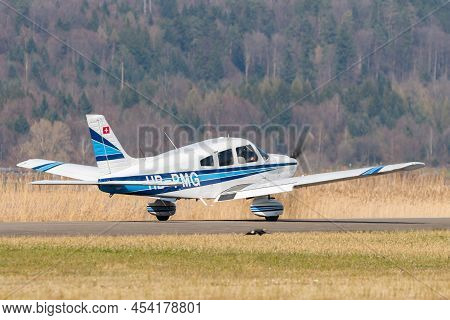 Wangen-lachen, Switzerland, March 27, 2022 Piper Pa28-181 Archer Ii Propeller Plane Is Taxiing On A 
