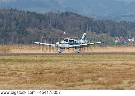 Wangen-lachen, Switzerland, March 27, 2022 Piper Pa28-181 Archer Ii Propeller Plane Is Departing Fro