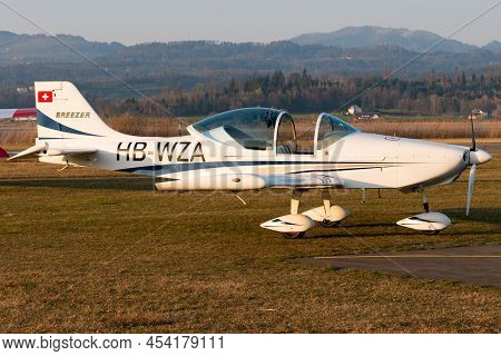 Wangen-lachen, Switzerland, March 27, 2022 Breezer B600 Propeller Plane On The Grass Parking On A Sm