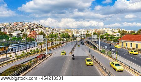 Panorama Of Piraeus Near Athens, Greece, Europe. Taxi Cars Move On City Road, Panoramic View Of High