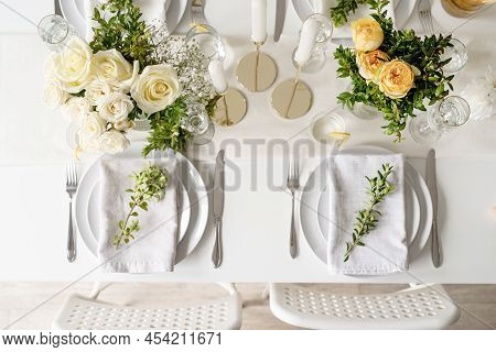 The Wedding Table Setting, Top View. Wedding Teble Decoration With White Roses And Boxwood