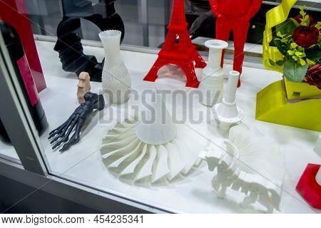 Models Printed On 3d Printer. Many Objects Printed On 3d Printer Made Of Plastic Close-up. Prototype