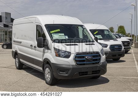 Fishers - Circa May 2022: Ford E-transit Cargo Van Display At A Dealership. The Ford E-transit Has A