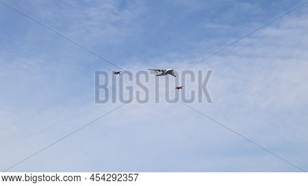 Moscow, Russia, May 2022: The Il-78 Tanker Aircraft. Accompanied By Mig-29 Fighters. Aircrafts Parti