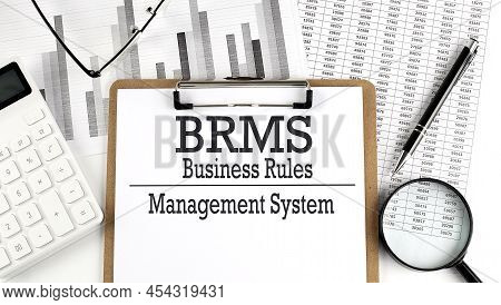 Paper With Brms - Business Rules Management System Table On A Charts, Business Concept