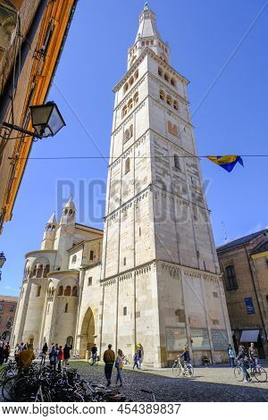 April 2022 Modena, Italy: Tower Ghirlandina Of The Duomo Modena On The Square Piazza Della Torre On 