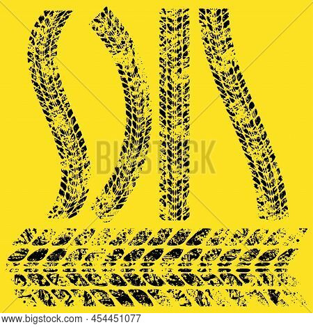 Set Of Black Ink Blots Tire Track Silhouettes Isolated On Yellow Background. Vehicle Brake Down Path